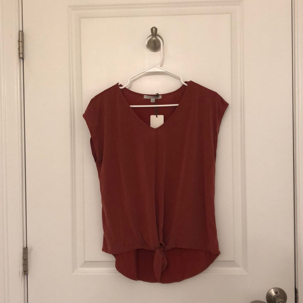 Small Red Top From Green Envelope